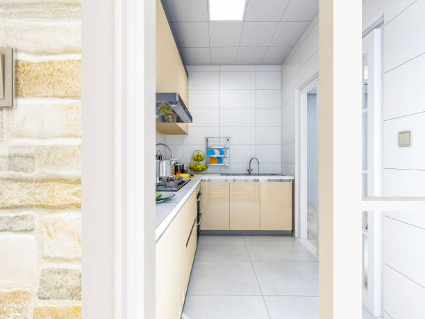 istock Modern apartment with clean and tidy kitchen, whole cabinets and various cooking utensils 1073514468