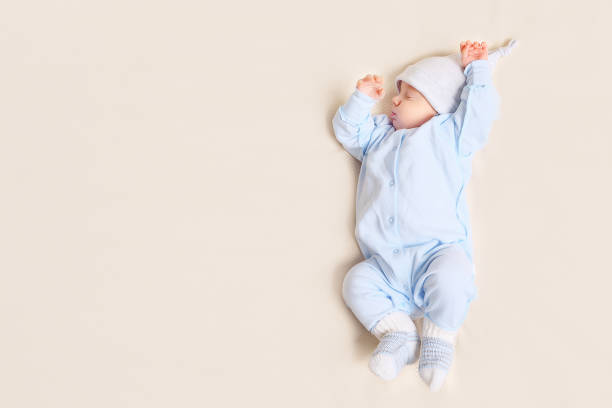 Cute baby sleeping on bed