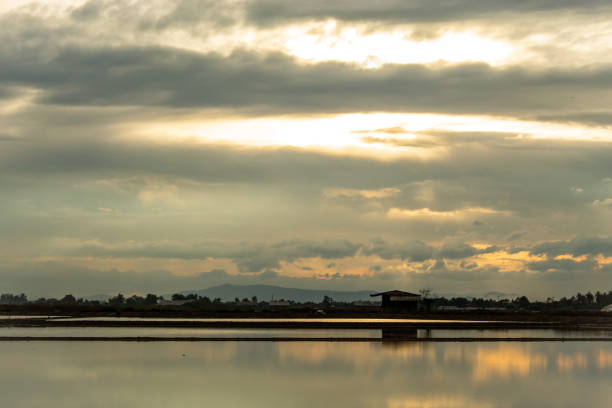 istock Sunset light reflects from the surface of the water. 1073528102