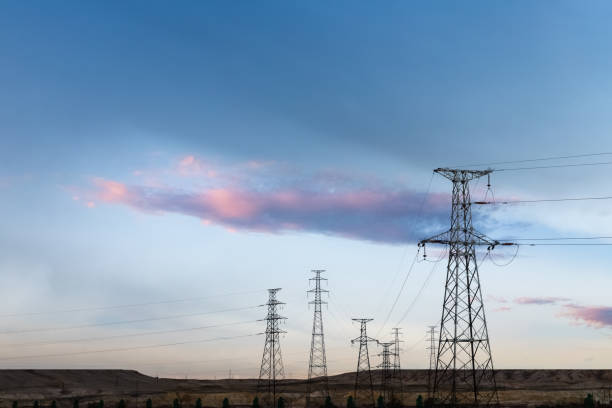 istock electric towers on wilderness 1073531196