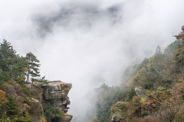 istock clouds and fog in valley 1073534796