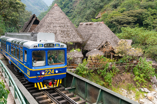 Aguas Calientes, Peru - Sep 14, 2018: Peru Rail train arriving at Machu Picchu Station in Aguas Calientes