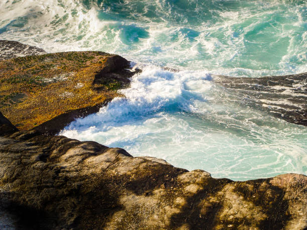 istock The wild water fighting with the rocks 1073545494