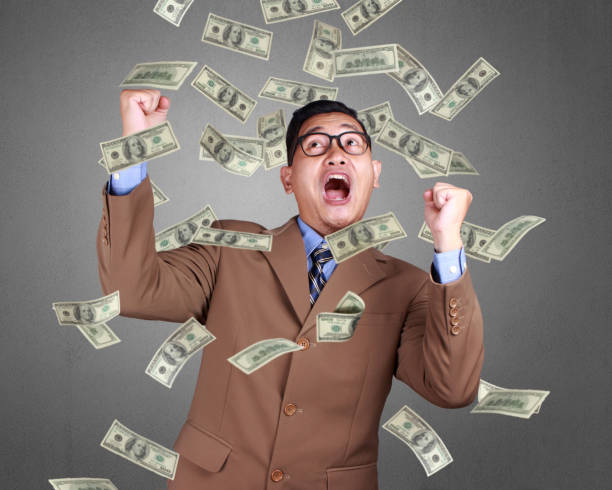 istock Young Businessman Winning Gesture 1073551818