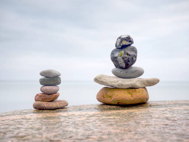 istock Stack of rounded stones on the sea beach.  Pyramid 1073552782
