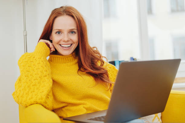 istock Excited enthusiastic young woman looking at camera 1073554882