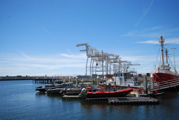 Looking toward Howard Terminal from the ferry dock in Jack London Square in downtown Oakland, California. The Oakland Fire Department boat is in the foreground. The Oakland A's have considered building a new ballpark at the location.