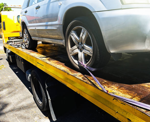 istock Car being attached to tow truck 1073572764