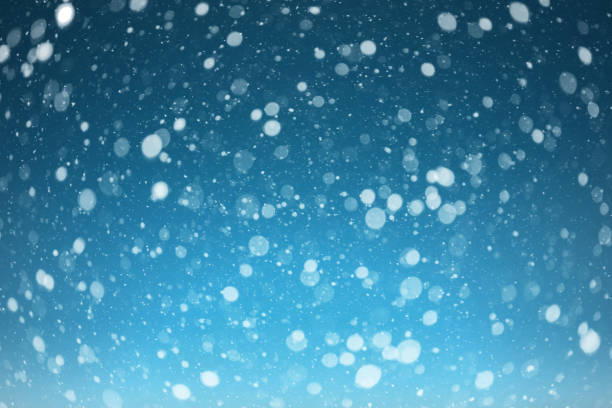 istock a snow  on the black backgrounds 1073574526