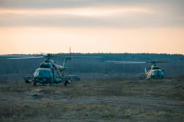istock aircraft helicopter evening sky on the ground 1073577592