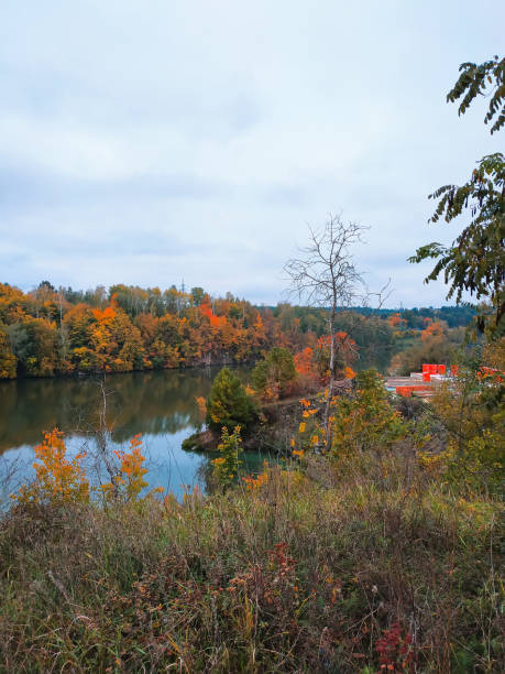 istock River running through the beautiful autumn landscape 1073577634