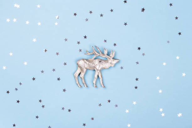 istock Christmas reindeer and confetti. 1073579852