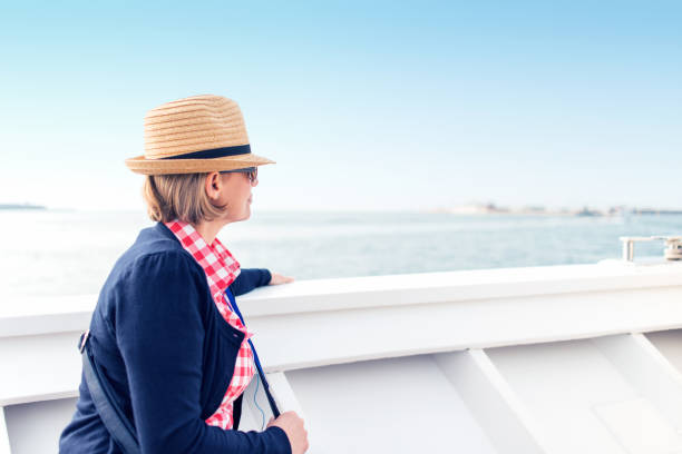 A tourist on a deck of a cruise ship