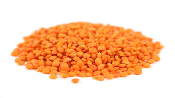 istock pile red lentils isolated on white background 1073585070