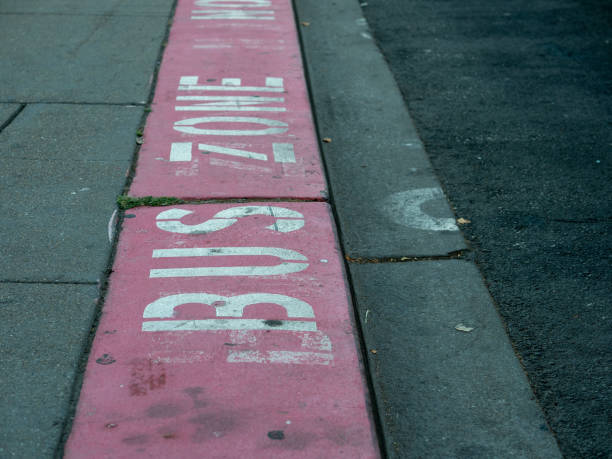 istock Bus zone red curb restricted area on street 1073587680