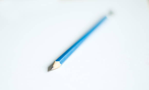 Photo of pencil shavings close-up isolated on white background. Decorative element for designers