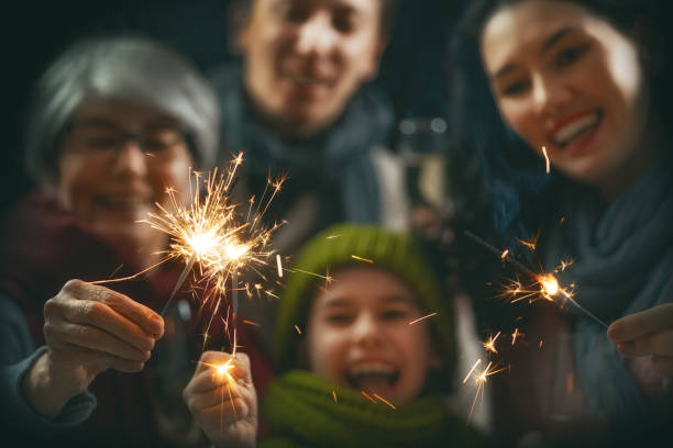 Family having fun on New Year. Merry Christmas and Happy Holiday! Family having fun on New Year. family christmas party stock pictures, royalty-free photos & images