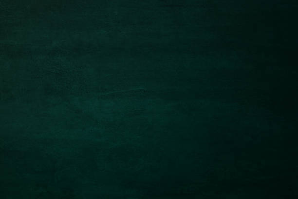 istock Empty green chalkboard or school board background and texture, education and back to school concept. 1073605164