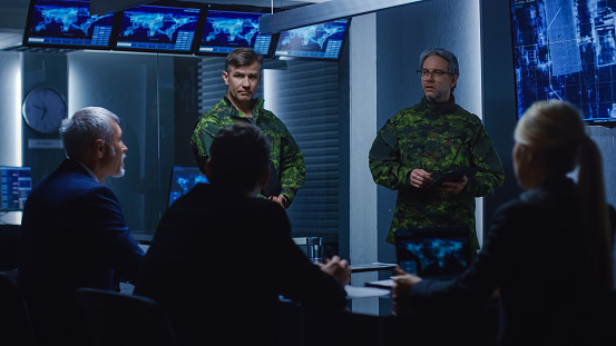 High-Ranking Military Men holds a Briefing to a Team of Government Agents and Politicians, Shows Footage of Satellite Following Target Car Surveillance.