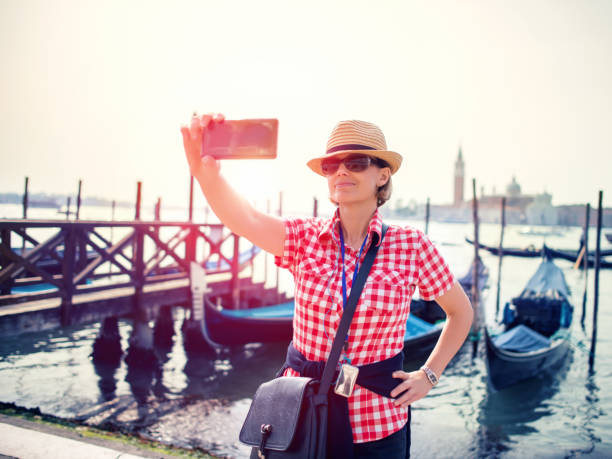 istock Tourist in Venice making selfie 1073609994