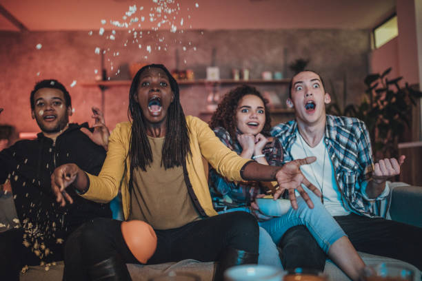 istock Watching a movie at home 1073619726