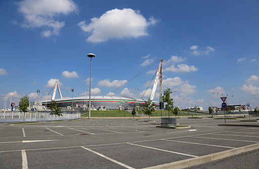 Turin, TO, Italy - August 27, 2015:  wide angle view with parking lot of the Juventus Stadium without people