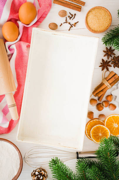 istock Christmas gingerbread, spice, cookie cutters and rolling pin. 1073624894