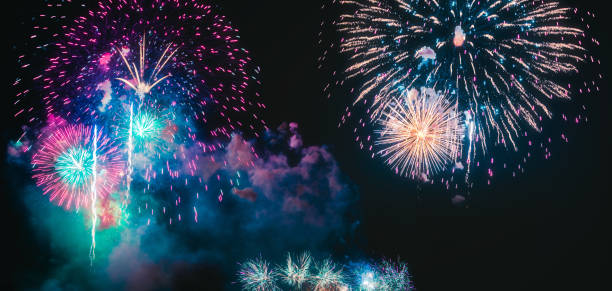 istock Colorful fireworks explosion on the black background 1073632694