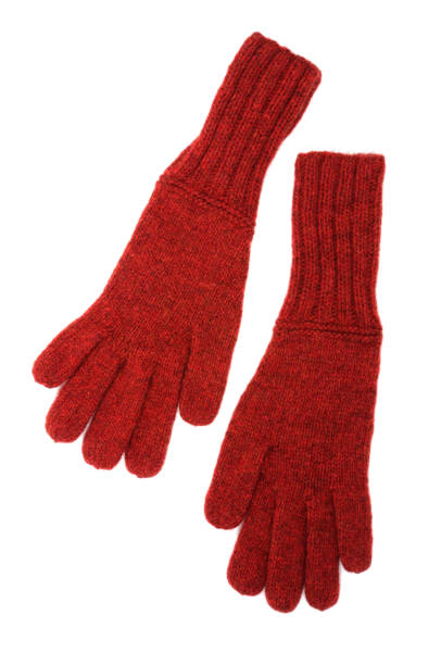 istock Red knitted gloves isolated on white background. 1073635588