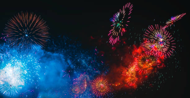 istock Colorful fireworks explosion on the black background 1073636296