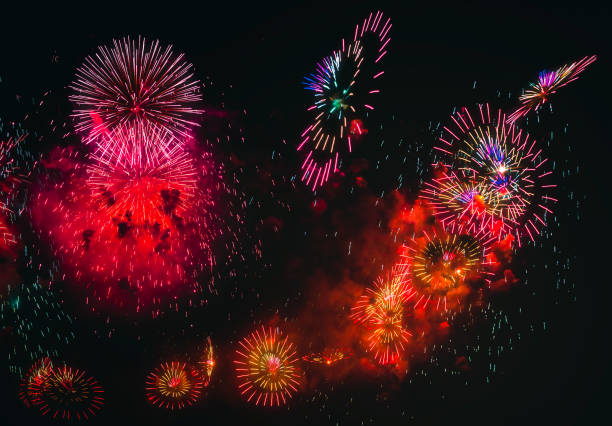 istock Colorful fireworks explosion on the black background 1073636752