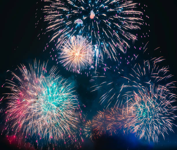 istock Colorful fireworks explosion on the black background 1073636900