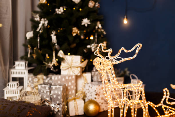 istock christmas deer with sleigh made of led strip 1073643634