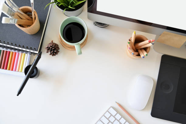 istock Top view artist workspace, creative supplies and copy space 1073652566