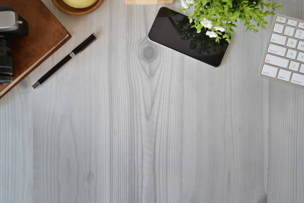 istock Office wooden workspace office gadget and copy space. 1073653416
