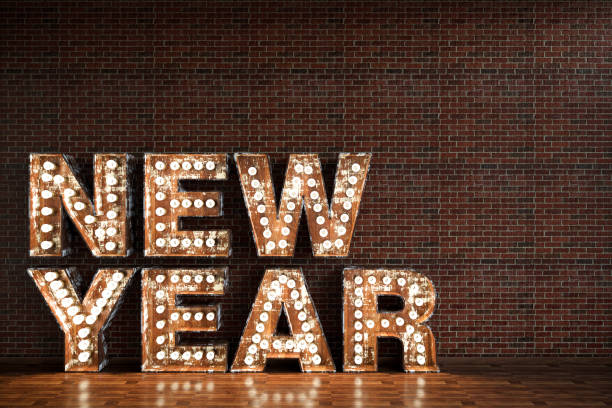 istock New Year Light Bulb Sign Against Black Brick Wall 1073653616