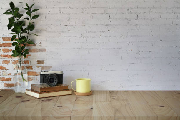 istock Workplace and copy space, wood table and mockup hipster supplies 1073655686