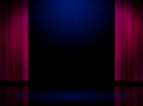 Stage with open curtains and blue light