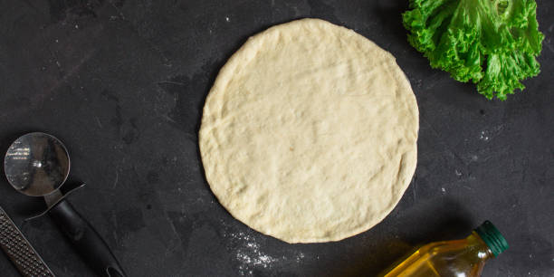 pizza, dough, ingredients, tortilla (cooking process). Top view with copy space