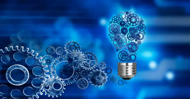 Photo of Innovation with ideas and concepts featuring a light bulb cogs working Business isolated