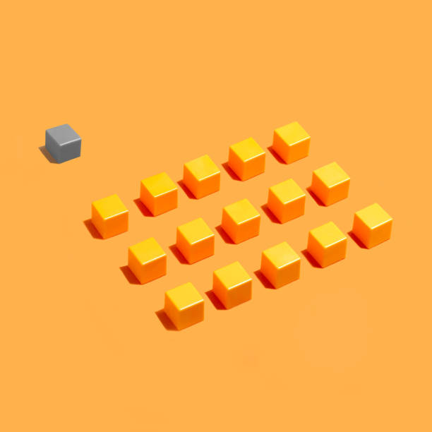 istock Outsider position: rows of yellow identical cubes and behind gray 1073682850
