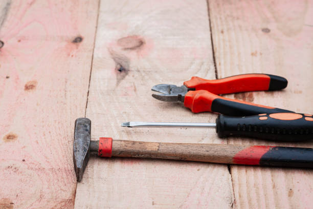 istock Set of vintage hand construction tools on a wooden background with copy space for text 1073708362