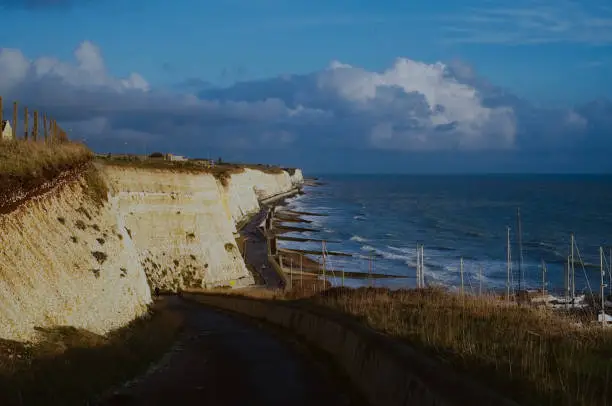 Photo of famous white cliffs of the united kingdom england close to the Brighton Marina at the south along the english channel at sunset