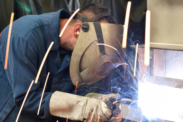 istock welder works in metal construction - construction and processing of steel components 1073712696