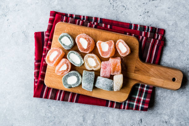 istock Fruity Turkish Delight Roll Shaped on Wooden Board. 1073713272