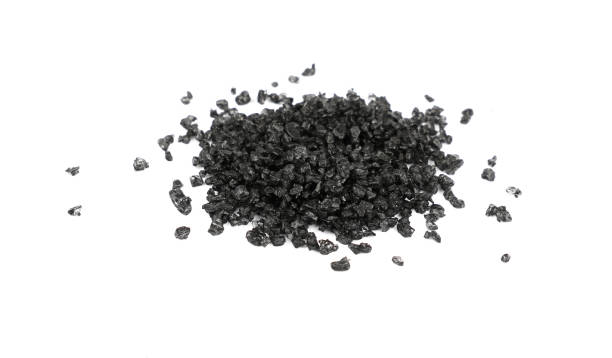 istock Close up black Hawaiian salt isolated on white 1073715568