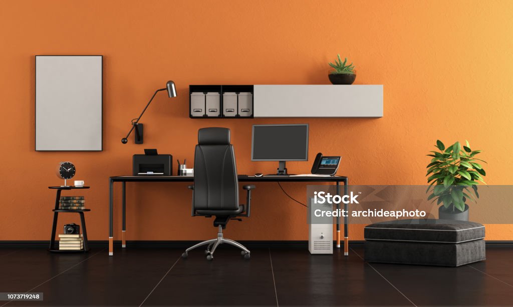 Black and orange home office Black and orange home office with minimalist desk with pc - 3d rendering
Note: the room does not exist in reality, Property model is not necessary Home Office Stock Photo