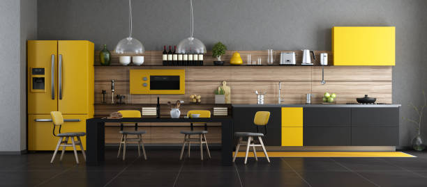 cucina moderna nera e gialla - domestic kitchen appliance home interior house foto e immagini stock