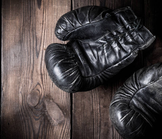 istock pair of old leather boxing gloves 1073723600