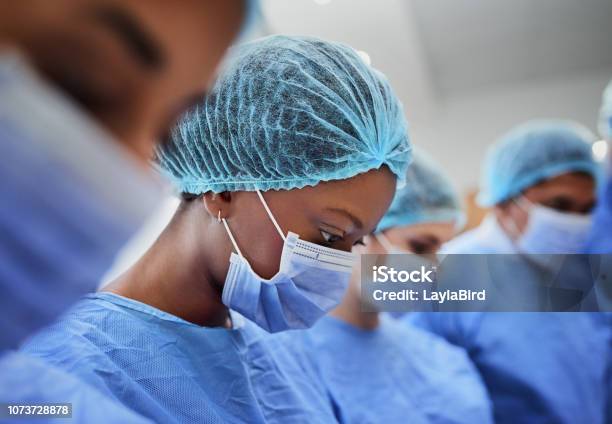 Focused On Saving A Life Stock Photo - Download Image Now - Nurse, African Ethnicity, Healthcare And Medicine